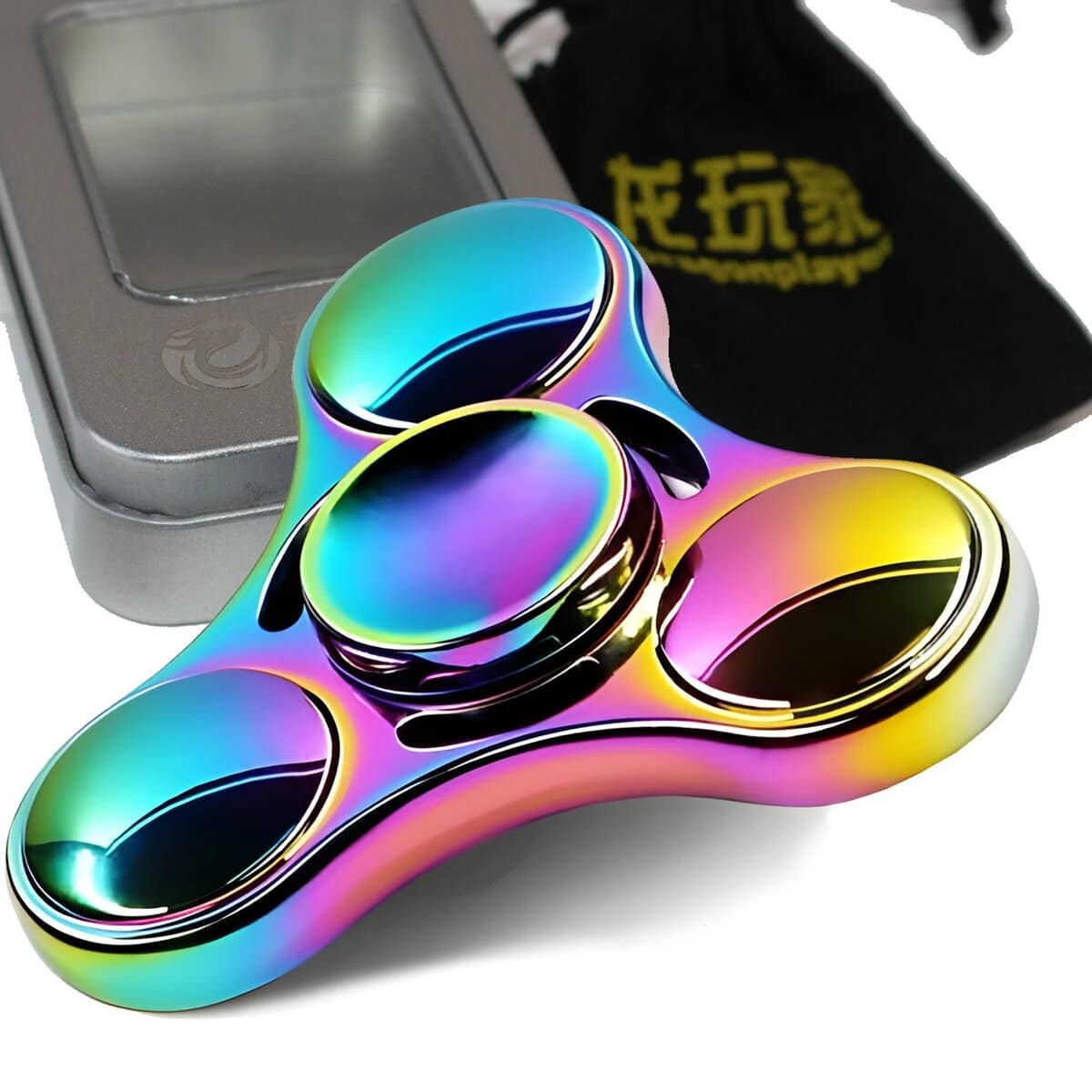 Colorful rainbow-finished fidget spinner with three spinning arms, designed for stress relief and focus enhancement, placed next to a metallic case.