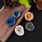 Geode mineral specimens with colorful crystalline interiors for science education and home decor.