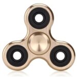Gold fidget spinner with three spinning arms and black bearings, designed for stress relief and focus enhancement.