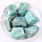 Natural Amazonite mineral stones with vibrant turquoise-green color, perfect for science decor and educational displays.