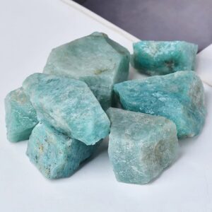 Authentic turquoise mineral rocks showcasing vibrant blue-green hues, perfect for science decor, educational displays, or mineral collection enthusiasts.