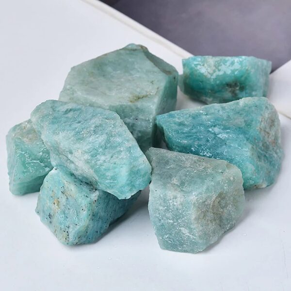 Authentic turquoise mineral rocks showcasing vibrant blue-green hues, perfect for science decor, educational displays, or mineral collection enthusiasts.