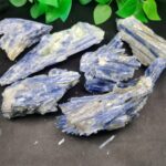 Blue mineral crystals with a layered, striated appearance, ideal for science decor and educational toys. Perfect for geology projects, science experiments, and decorative displays.