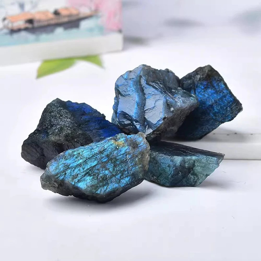 Natural blue labradorite mineral stones with iridescent blue and green hues, perfect for educational displays, science decor, and gemstone collections.