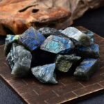Iridescent mineral rocks showcasing vibrant blue and green hues, perfect for educational science displays and decorative science decor.