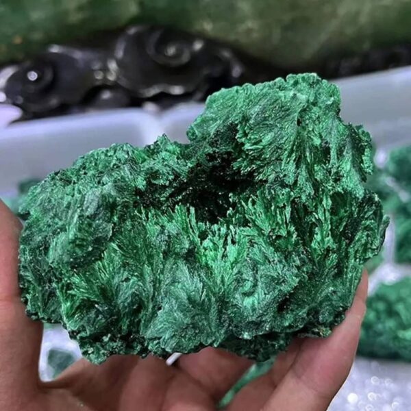 Close-up of a vivid green mineral specimen showcasing intricate crystalline textures and natural formations, ideal for science decor and educational displays.
