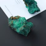 Mineral specimen showcasing vibrant green and brown hues, ideal for educational purposes and scientific displays.