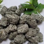 Pyrite mineral rocks with metallic luster and gold-like appearance, often called fool's gold.