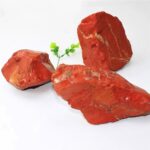 Red marble rocks with natural veining, suitable for science decor and educational displays. These stones are ideal for geology projects, science classrooms, and decorative purposes.