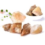 Assorted Himalayan salt crystals displayed on a white background, showcasing their natural colors and textures, ideal for educational science projects or decorative purposes.