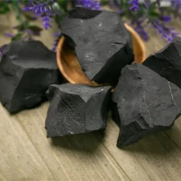 Black obsidian mineral specimens for educational and decorative purposes.