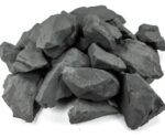 Black obsidian stones for educational and decorative purposes.