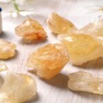 Natural golden quartz crystal stones, raw mineral specimens for educational and decorative purposes, showcasing their unique translucent and golden hues.