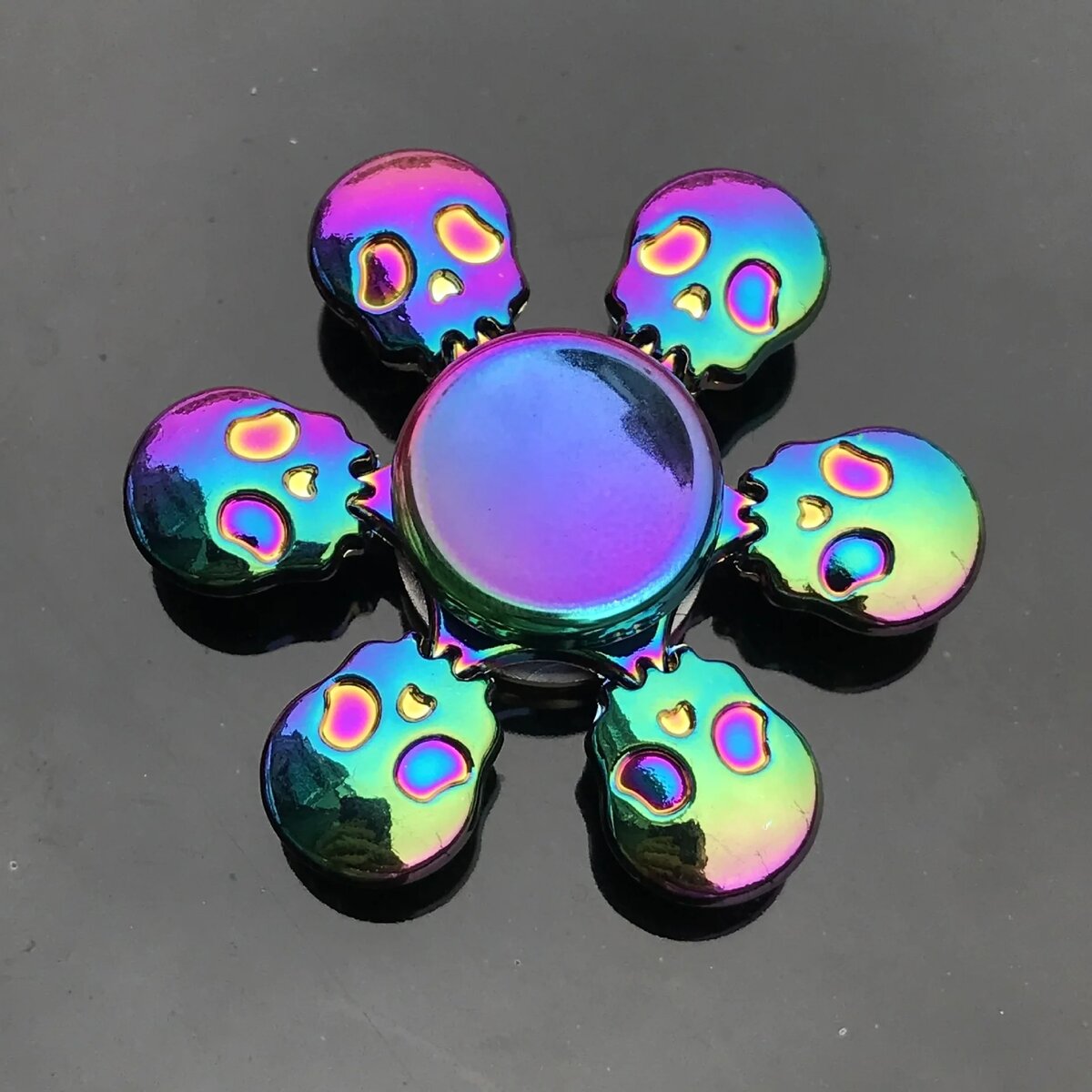 Colorful Skull and Circle Fidget Toy Set Bright rainbow-colored skull and circle fidget toys for stress relief and sensory play.