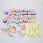 Brightly colored slime containers with assorted charms and decorations for creative slime making.