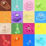 Colorful rainbow slime with cute fruit and animal charms in various vibrant colors, perfect for kids' sensory play and educational activities.
