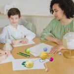 Educational science activity with children and teacher.