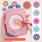Child's hand using a pink spirograph drawing toy to create intricate geometric patterns with colorful gears and pens, promoting creativity and fine motor skills.