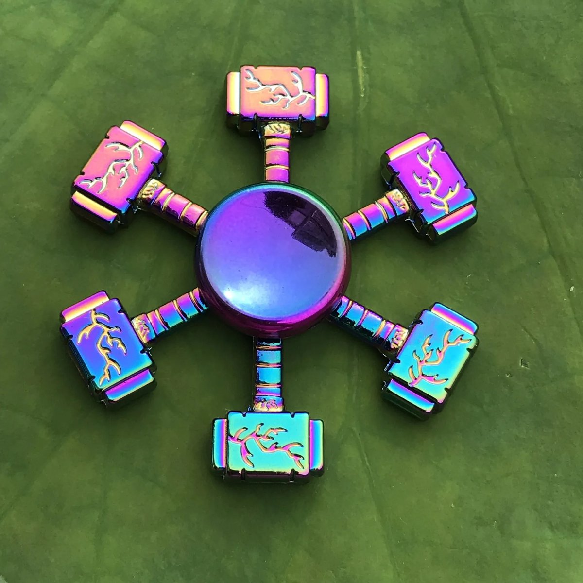 Magnetic Science Toy with Multiple Connectors Colorful magnetic science toy with six interconnected pieces on a green leaf background, designed for educational play and STEM learning.