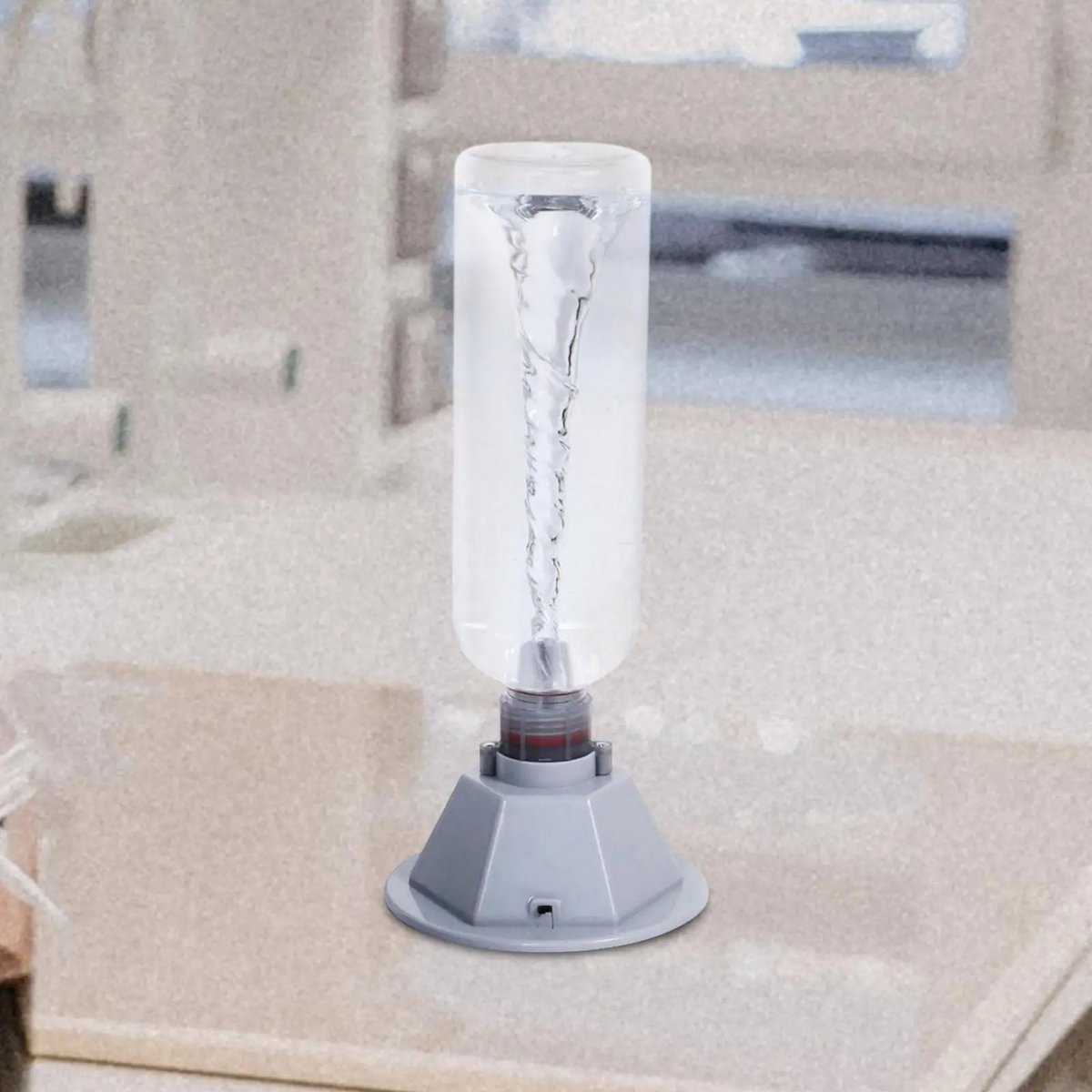 Electrolysis Science Kit for Educational Experiments A science experiment setup showing a glass container with water and a metal electrode connected to a power source, demonstrating electrolysis.