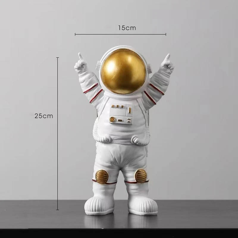 Astronaut Toy Figure with Gold Helmet An astronaut figurine with a shiny gold helmet, white suit, and detailed patches, standing 25cm tall and 15cm wide, perfect for science decor and educational displays.