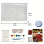 Complete volcano eruption science kit with tray, chemicals, goggles, and tools for educational science experiments.