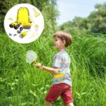 Child with butterfly net exploring nature with science toy set in outdoor field.