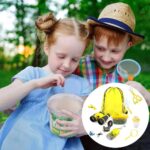 Exploring science with kids: children examining a bug-catching kit outdoors with a magnifying glass and educational tools.