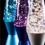 Colorful glow lava lamps with glitter and snowflake patterns, creating a mesmerizing and festive atmosphere. Perfect for science decor and educational toy displays.