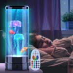 Brightly lit jellyfish aquarium with animated, glowing jellyfish and a remote control in front.
