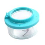 Small handheld magnifying glass with a blue rim and built-in LED light, ideal for detailed examination of small objects and educational activities.