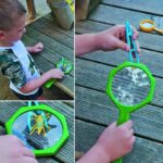 Child holding a green magnifying glass with insect catcher, exploring outdoors on wooden surface.