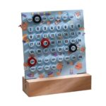 Interactive educational calendar featuring months, days, and dates with animal-themed decorations, designed for teaching children about time and dates in a fun, engaging way.