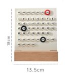 Interactive wooden calendar puzzle with movable date and day pieces for learning dates, days, and months. Perfect for classrooms and home educational activities.