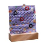 Interactive animal-themed educational calendar for kids with movable date and month markers.