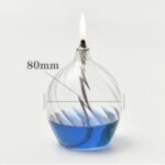 A glass container with a lightning bolt inside, demonstrating electrical discharge in a science experiment.