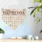 Decorative wooden family birthday calendar with heart-shaped markers for each month, perfect for tracking birthdays and special occasions at home or in the office.