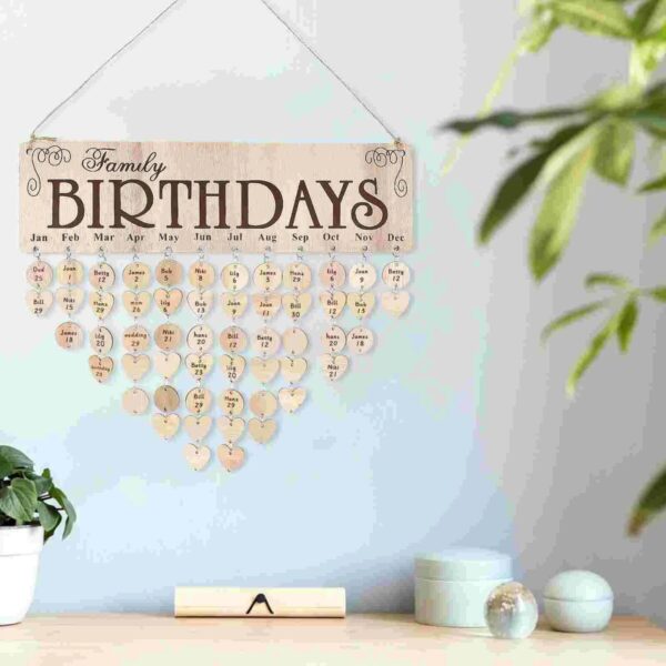 Decorative wooden family birthday calendar with heart-shaped markers for each month, perfect for tracking birthdays and special occasions at home or in the office.