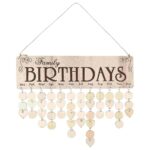 An artistic family birthday calendar wall hanging featuring heart-shaped cutouts for each month, perfect for organizing birthdays and special occasions in a stylish way.