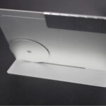 Close-up of a magnetic levitation device showing a magnet floating above a circular base, illustrating magnetic repulsion principles.