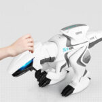 Robot dog with a human hand touching its head, designed for educational and entertainment purposes.