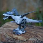 Detailed robotic T-Rex dinosaur toy with movable limbs and realistic features, perfect for science education and imaginative play.