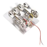 Educational electromagnetic motor model demonstrating electromagnetic principles with coils, magnets, and wires for science learning.