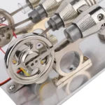 Close-up of a detailed mechanical model of a microscope used for science education and demonstrations.