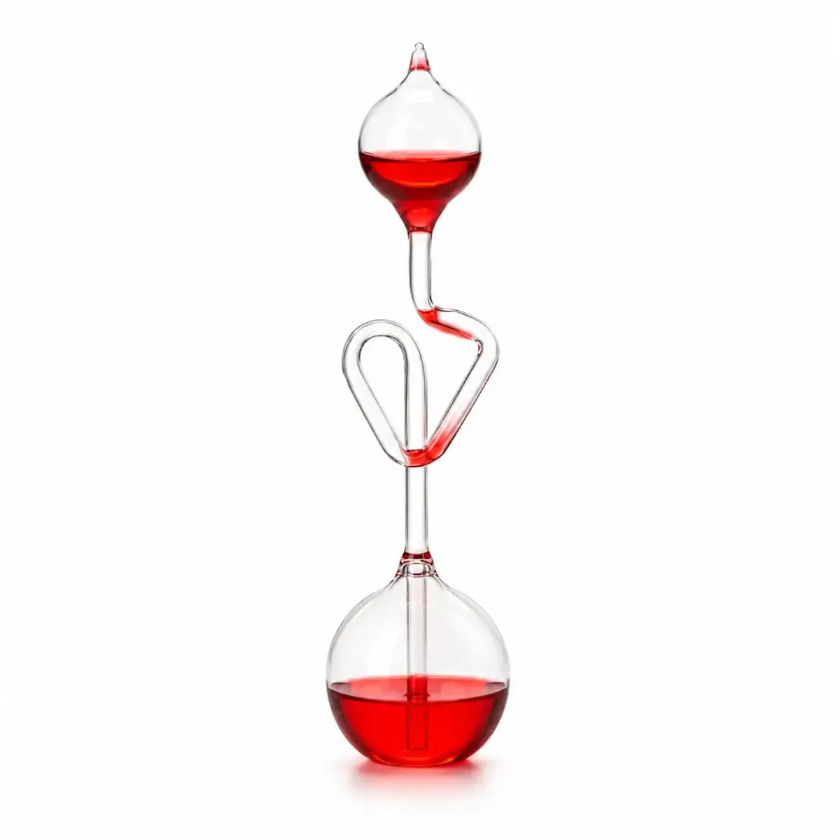 Glass chemistry apparatus with red liquid, demonstrating scientific experiments.