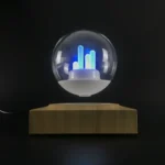 A modern science-themed LED desk lamp with a glass globe and colorful light bars, mounted on a wooden base, ideal for educational and decorative purposes.