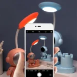 Cute astronaut and robot desk lamps with LED lights for science-themed decor and educational spaces.