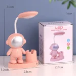 Adorable pink astronaut-themed LED lamp designed for children, featuring a playful astronaut figure with a flexible neck and a cozy base, perfect for bedrooms or playrooms.