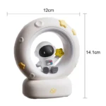 Adorable astronaut moon lamp with a cute space-themed design, perfect for science decor and educational toys. Compact size with dimensions of 12cm x 14.1cm, featuring a charming astronaut figure and m.