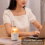 Salt lamp emitting a warm glow on a desk.